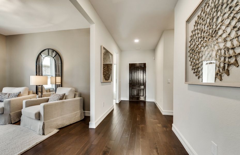 Entryway into home with views of flexible living s