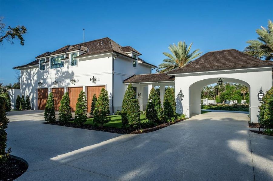 Front exterior of a new home in , Sarasota, FL, highlighting curb appeal (Image 25). Front exterior of a new home in , Sarasota, FL, highlighting curb appeal (Image 25).