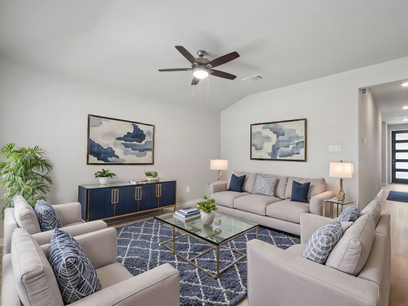 Virtually staged living room in the Briscoe floorplan at a Meritage Homes community. Virtually staged living room in the Briscoe floorplan at a Meritage Homes community.