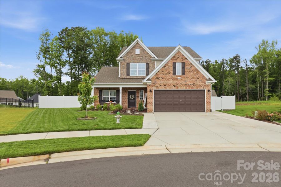Front exterior of a new home in , Advance, NC, highlighting curb appeal (Image 27).