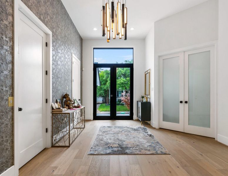 Come tour this airy foyer that features sleek designs elements throughout. Come tour this airy foyer that features sleek designs elements throughout.