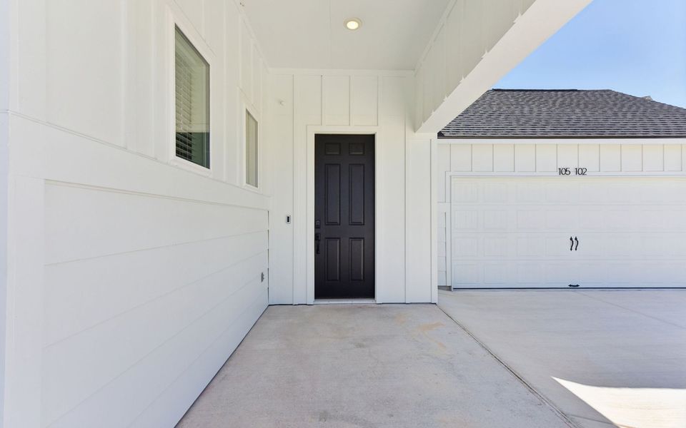 Exterior details and patio area of a home in Kissing Tree, San Marcos (Image 15).