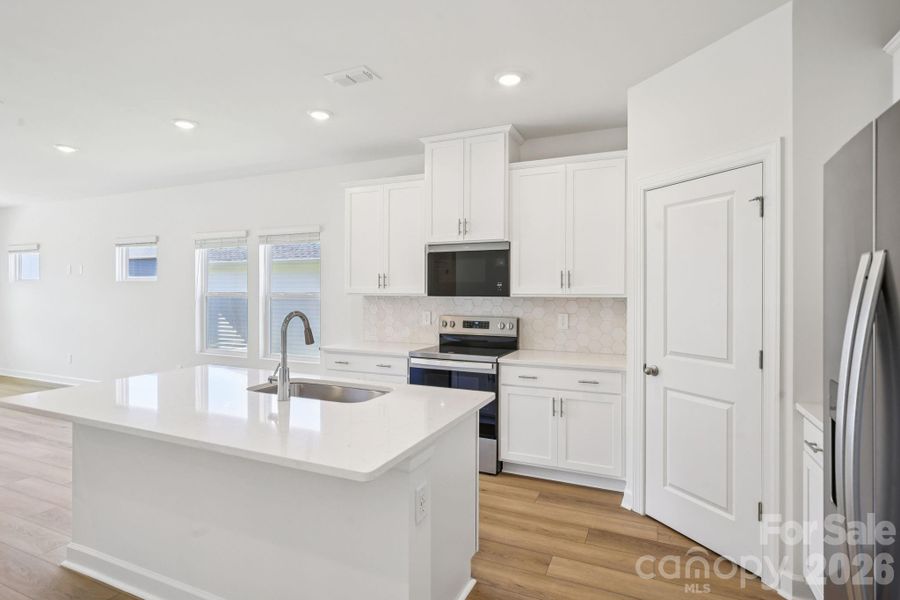 Photo is not of the actual home, but is an inspirational photo of builder’s model home and may depict options, furnishings, and/or decorator features that are not included