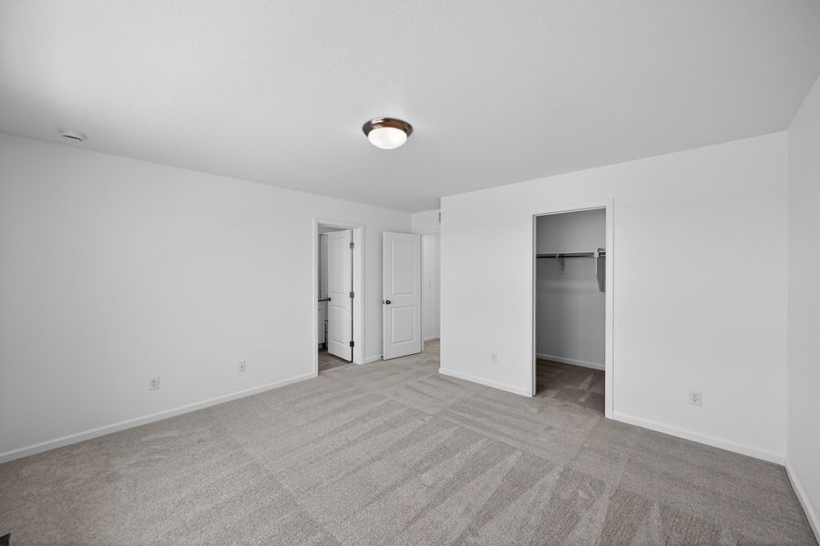 Spacious, unfurnished interior of a new home in Sky Ranch, Watkins (Image 11).