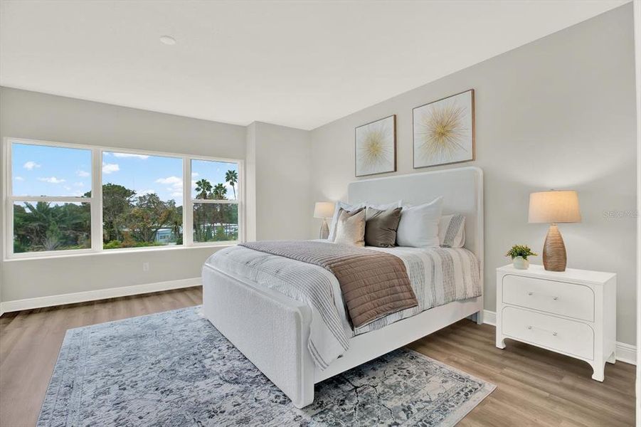 Furnished interior view inside a new home in The Towns At Long Bayou, Seminole (Image 9).