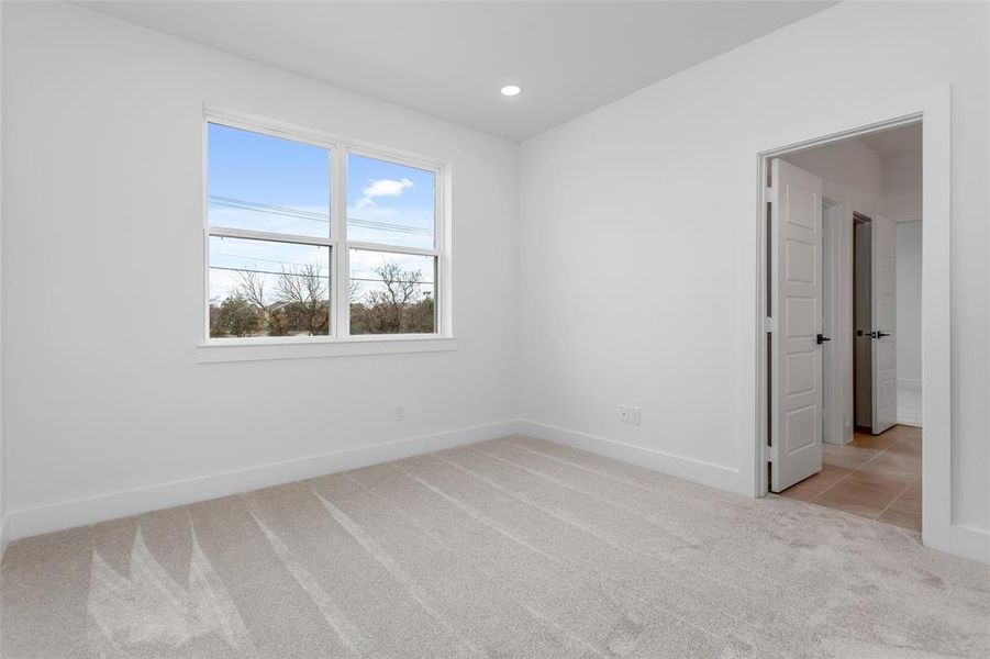 View of carpeted spare room