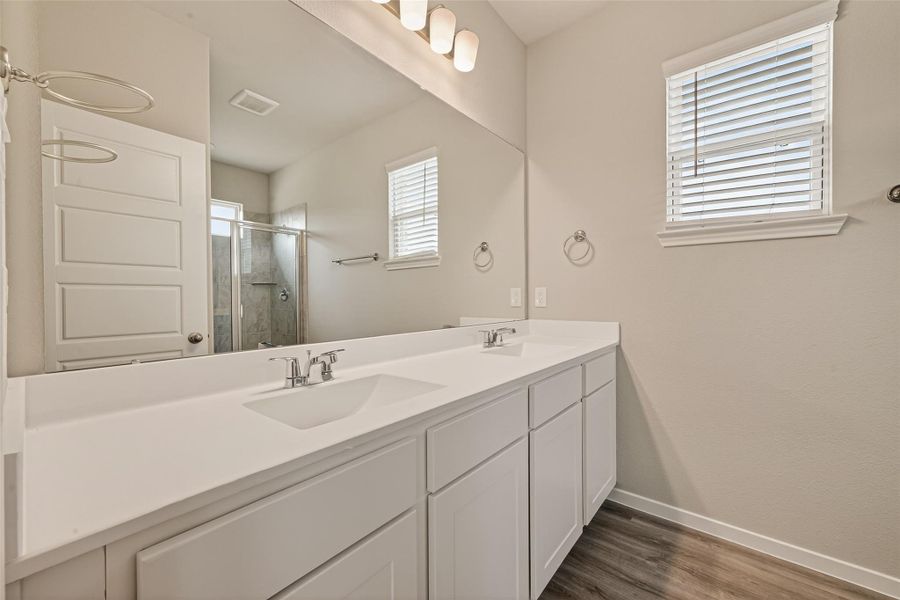 Furnished interior view inside a new home in Sunterra, Katy (Image 12).