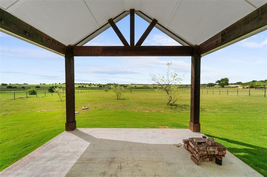 View of patio with a rural view