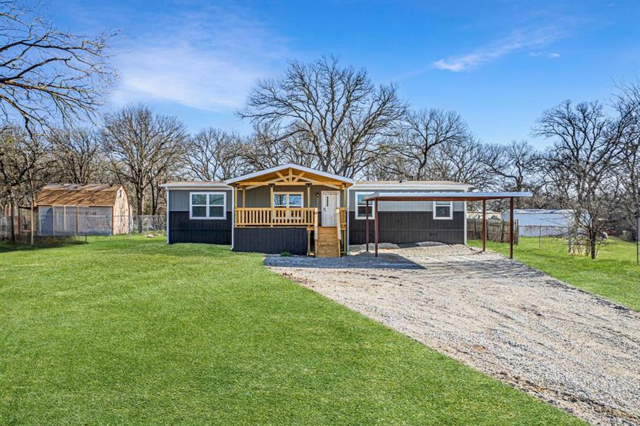 Exterior details and patio area of a home in , Azle (Image 3).