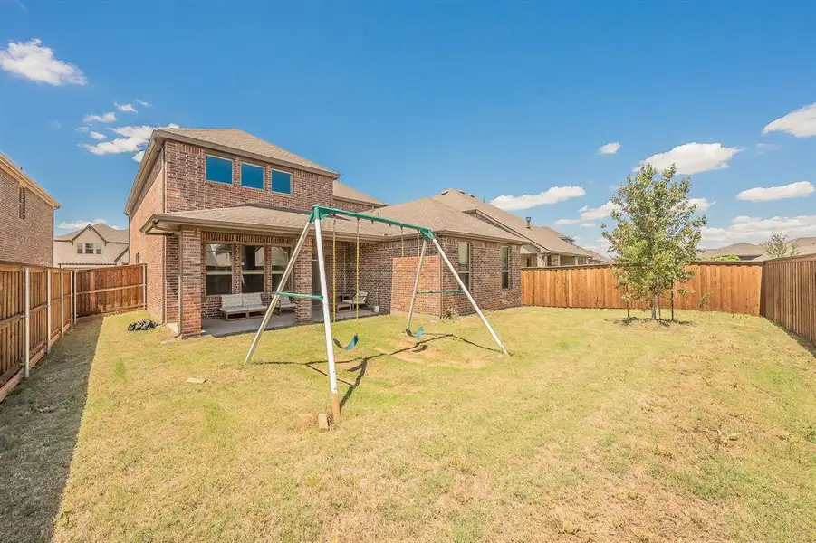 Exterior details and patio area of a home in , Little Elm (Image 19).