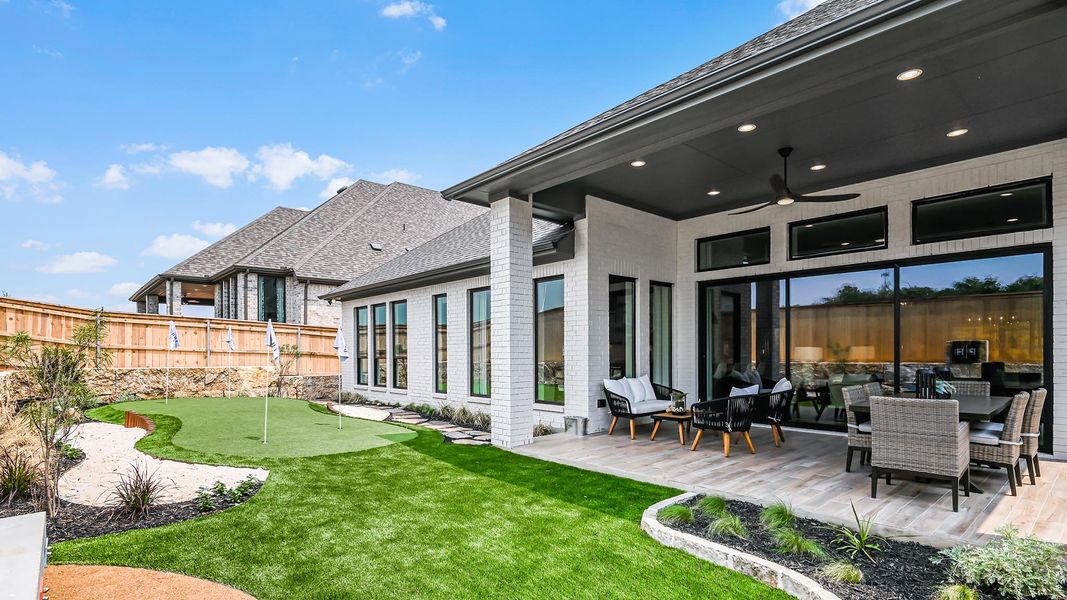 Exterior details and patio area of a home in Trinity Falls, McKinney (Image 26).