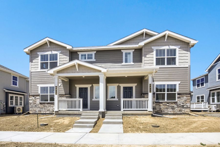 Front exterior of a new home in Timber Lark, Fort Collins, CO, highlighting curb appeal (Image 1). Front exterior of a new home in Timber Lark, Fort Collins, CO, highlighting curb appeal (Image 1).