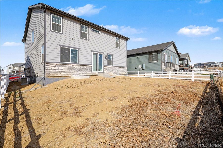Exterior details and patio area of a home in Murphy Creek, Aurora (Image 27).