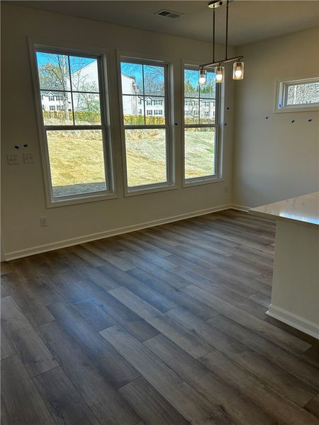 Bright interior space features expansive windows a