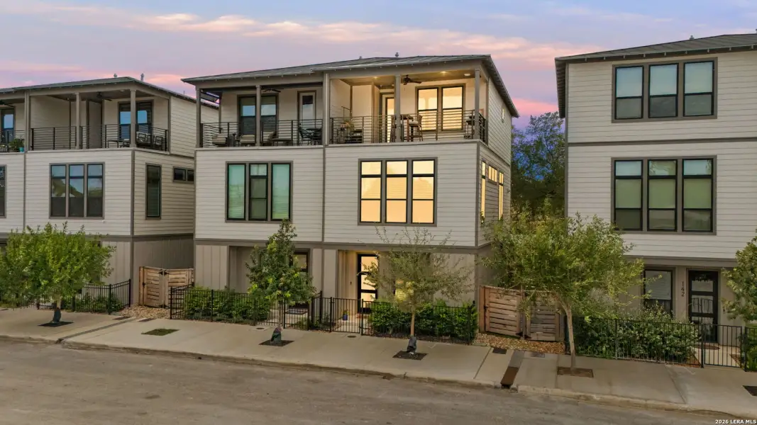 Front exterior of a new home in Playmoor, San Antonio, TX, highlighting curb appeal (Image 25).