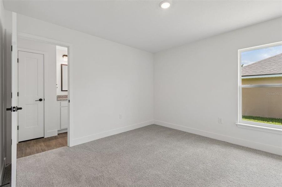 Spacious, unfurnished interior of a new home in Abbey Glen, Dade City (Image 53).