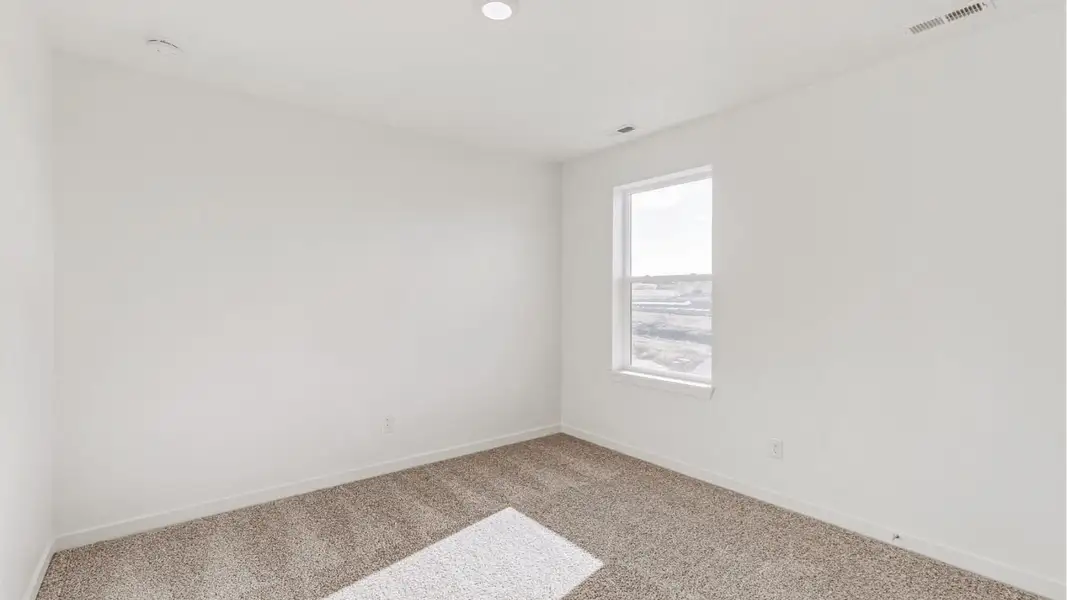 Representative unfurnished interior of a home built from the Elm by D.R. Horton in Granary, Johnstown (Image 15).