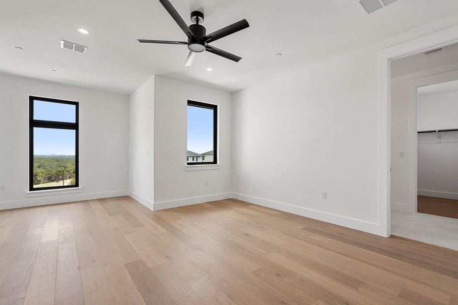 Spacious, unfurnished interior of a new home in Milky Way at River Place, Austin (Image 23).