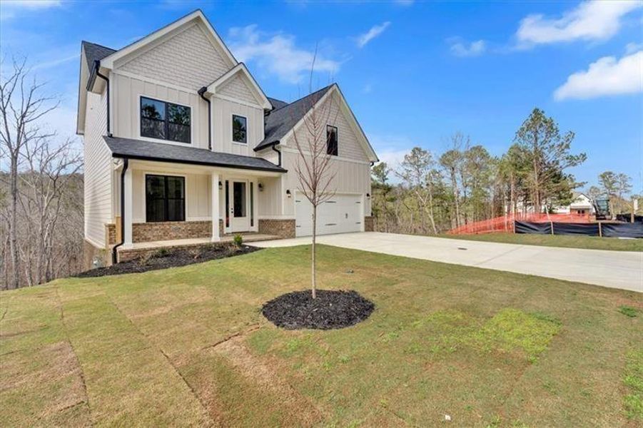 Front exterior of a new home in , Cartersville, GA, highlighting curb appeal (Image 20).