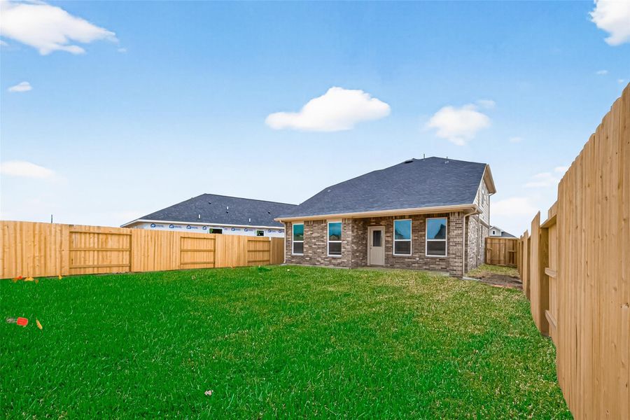 Exterior details and patio area of a home in Rates starting as low as, Iowa Colony (Image 25).