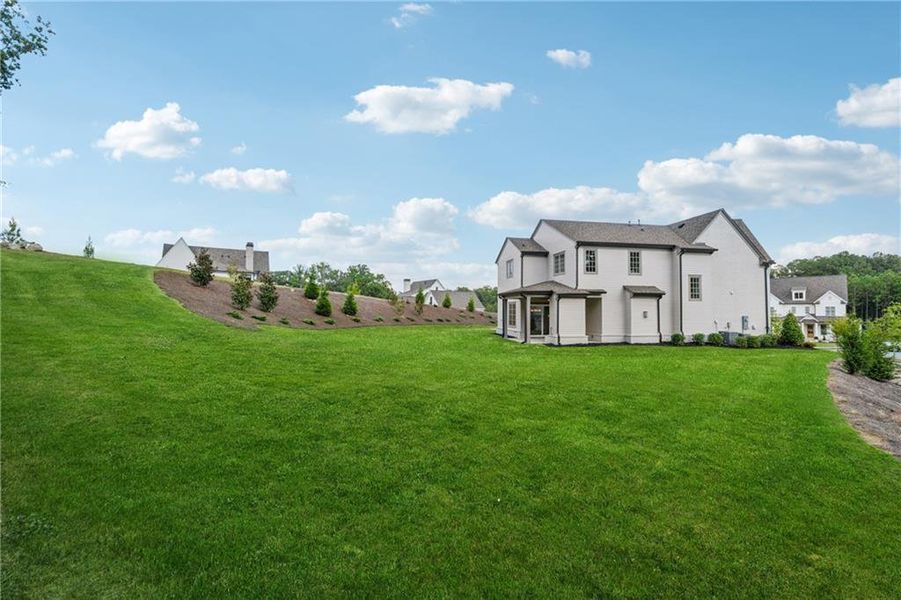 Front exterior of a new home in , Acworth, GA, highlighting curb appeal (Image 27). Front exterior of a new home in , Acworth, GA, highlighting curb appeal (Image 27).