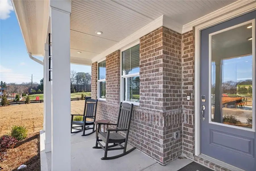 Exterior details and patio area of a home in Linden Grove, Powder Springs (Image 31).