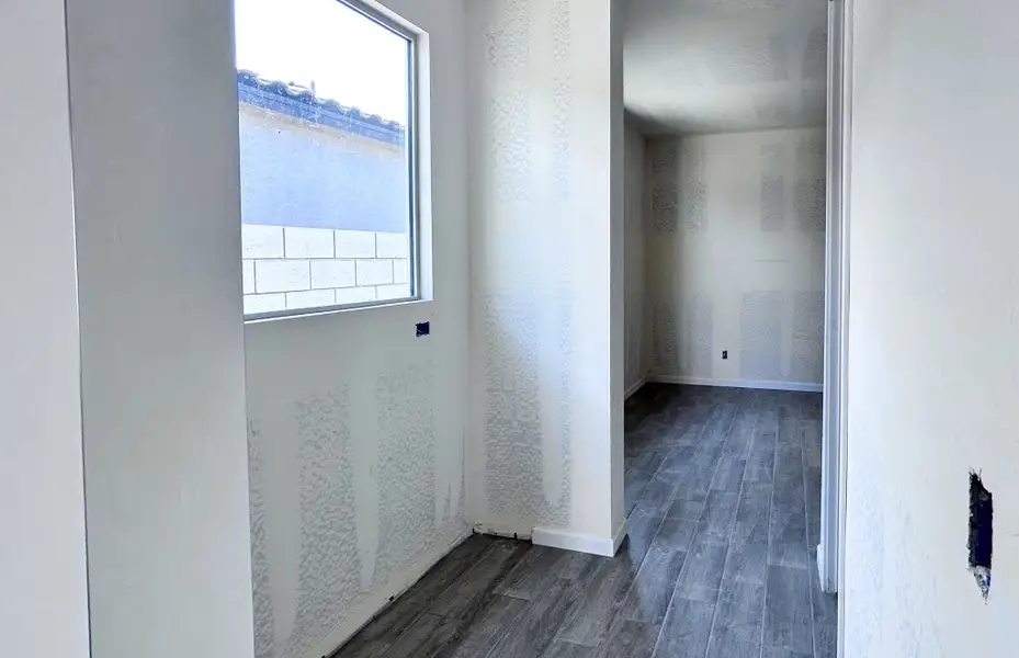 Butler's pantry with pass through to formal dining