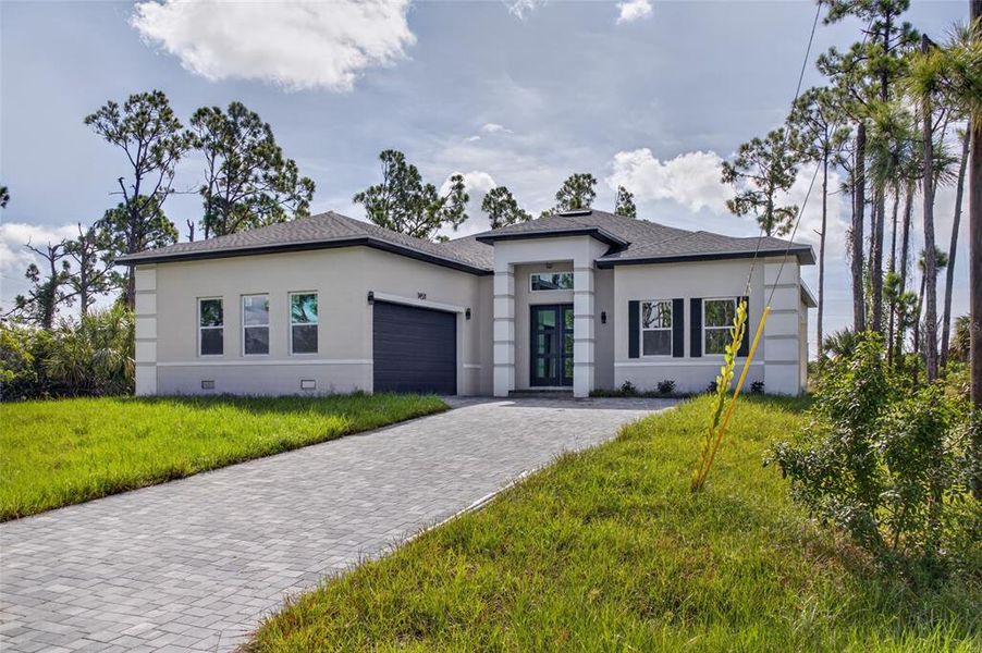 Front exterior of a new home in , Port Charlotte, FL, highlighting curb appeal (Image 28).