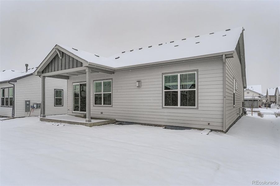 Exterior details and patio area of a home in Hilltop 55+ at Inspiration 55s, Aurora (Image 2).