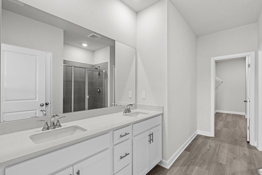 Furnished interior view inside a new home in Cypress Ridge - The Boardwalk Series, Longs (Image 9).