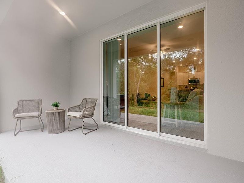 Your interior opens to outdoor living space on a large covered lanai - Aspen townhome by Highland Homes Your interior opens to outdoor living space on a large covered lanai - Aspen townhome by Highland Homes