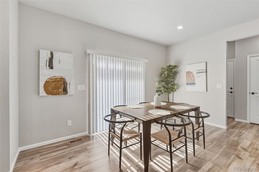 Furnished interior view inside a new home in Woodrose at Painted Prairie, Aurora (Image 14).