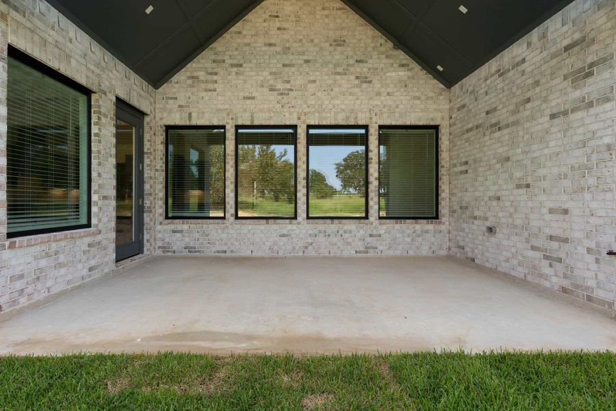 Exterior details and patio area of a home in Chapel Bend, Montgomery (Image 4). Exterior details and patio area of a home in Chapel Bend, Montgomery (Image 4).