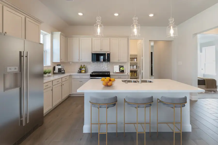 Representative furnished interior of a home built from the Marshfield by Beazer Homes in Ellwood, Iowa Colony (Image 6).