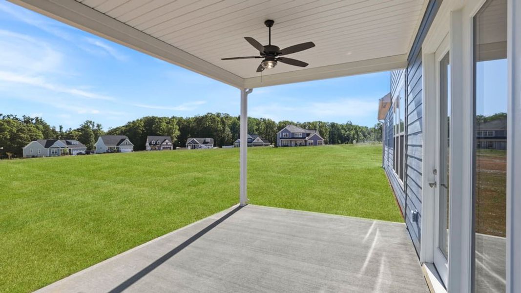 Exterior details and patio area of a home in Alder Pond, Campobello (Image 3).
