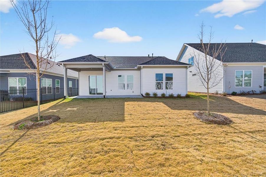 Exterior details and patio area of a home in The Reserve at Bells Ferry, Kennesaw (Image 20).