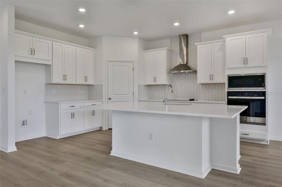 Furnished interior view inside a new home in Crossroads at Kelly Park, Apopka (Image 8). Furnished interior view inside a new home in Crossroads at Kelly Park, Apopka (Image 8).