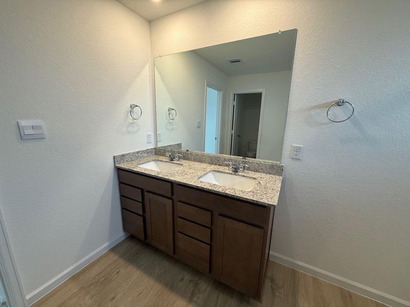 Furnished interior view inside a new home in Midtown Reserve, College Station (Image 4).