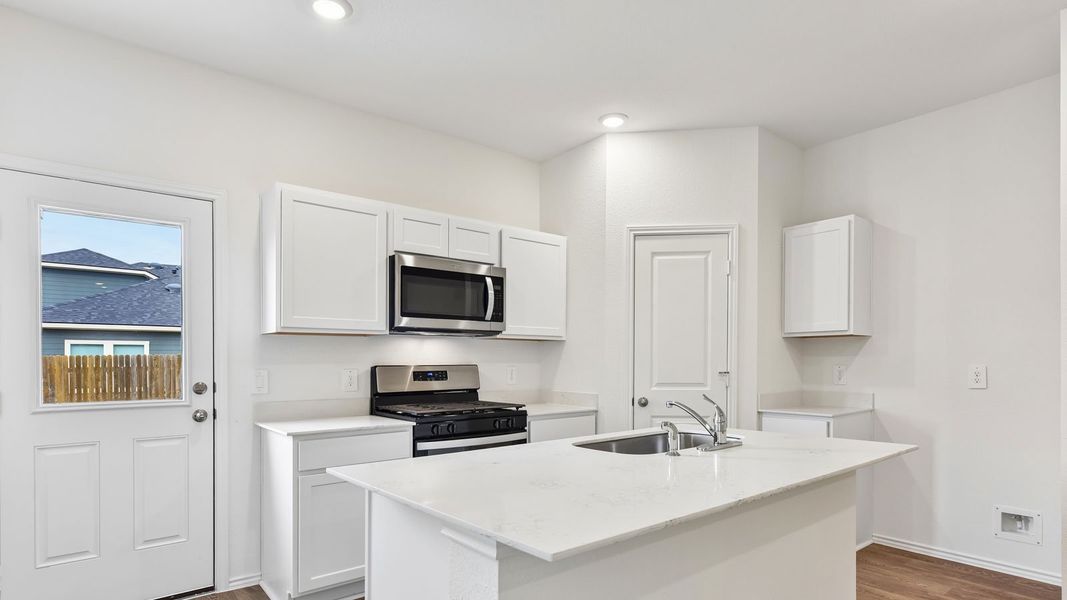 Furnished interior view inside a new home in Wayside, Uhland (Image 7).