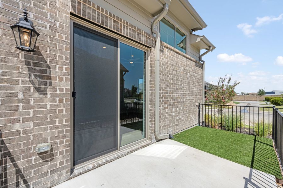 Exterior details and patio area of a home in Woodbridge Villas, Wylie (Image 30).
