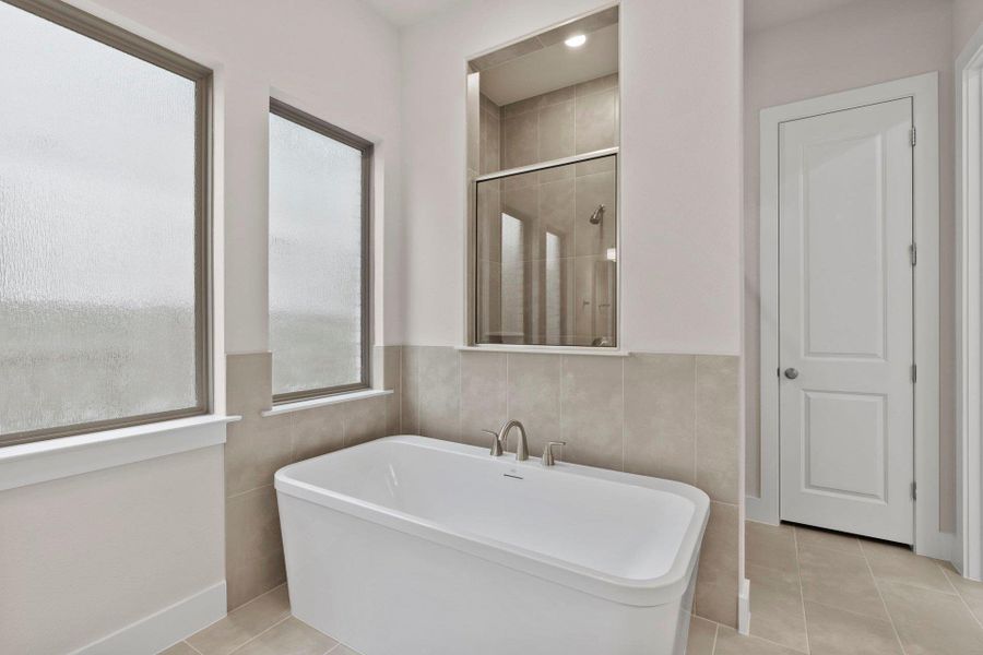 Primary Bath retreat with soaking tub & walk-in shower
