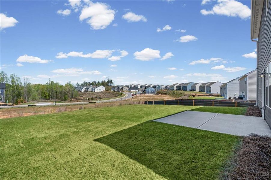 Exterior details and patio area of a home in Twin Lakes, Hoschton (Image 30).