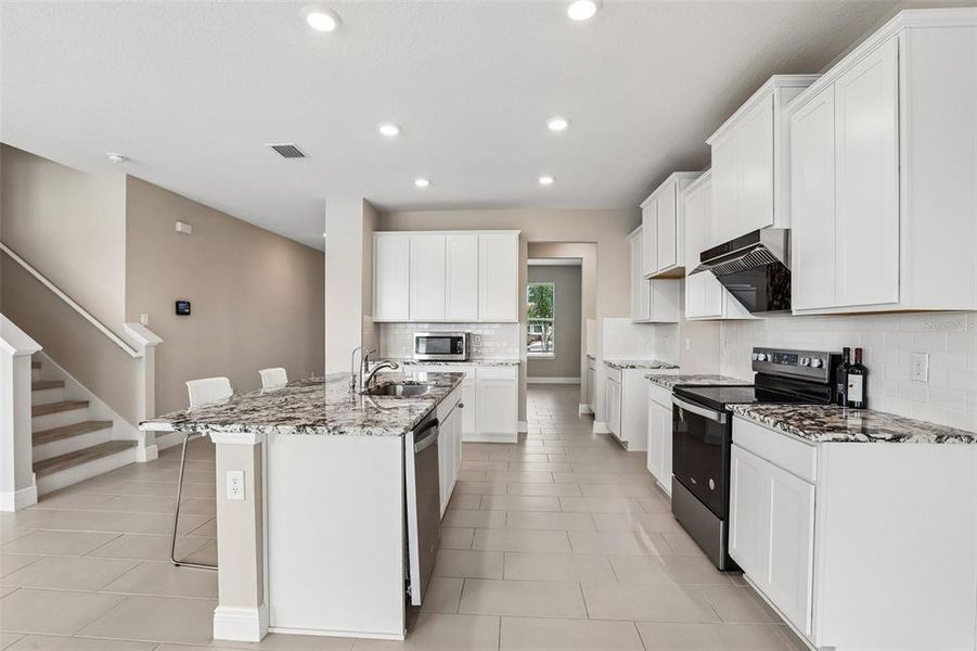 Furnished interior view inside a new home in Mangrove Manor, Apollo Beach (Image 9).