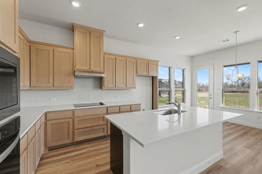 Representative furnished interior of a home built from the The Pear by Sumeer Homes in Stone Henge II, Sanger (Image 8). Representative furnished interior of a home built from the The Pear by Sumeer Homes in Stone Henge II, Sanger (Image 8).