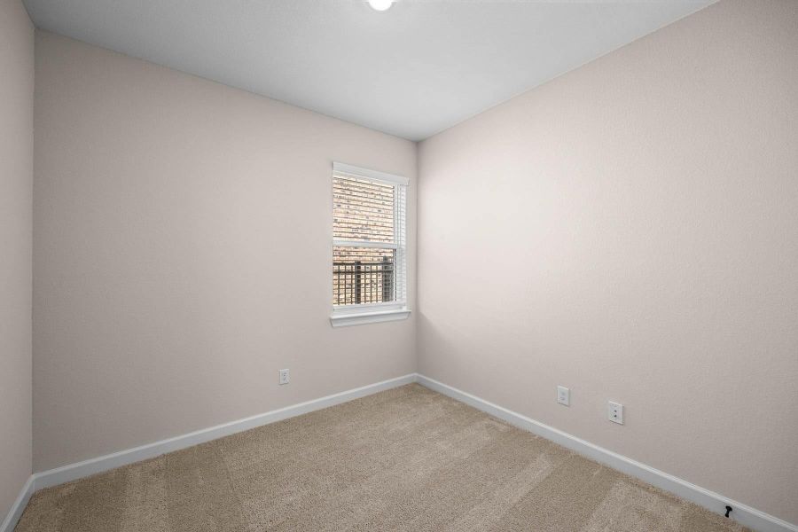 Spacious, unfurnished interior of a new home in Sunterra, Katy (Image 12).