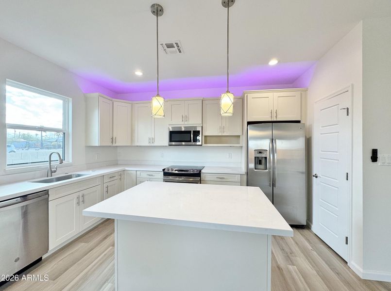 Back lighting over cabinets