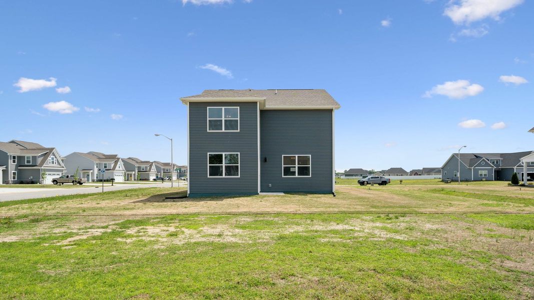 Representative exterior photo of a completed home built from the Pine by D.R. Horton in Tooley Harbor, Elizabeth City, NC (Image 26).