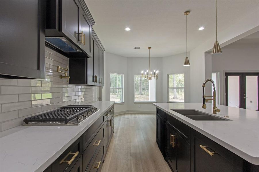 Soft-closing drawers and cabinetry add a touch of luxury to the kitchen.