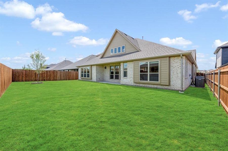 Exterior details and patio area of a home in Wildflower Ranch 60-65, Justin (Image 4). Exterior details and patio area of a home in Wildflower Ranch 60-65, Justin (Image 4).