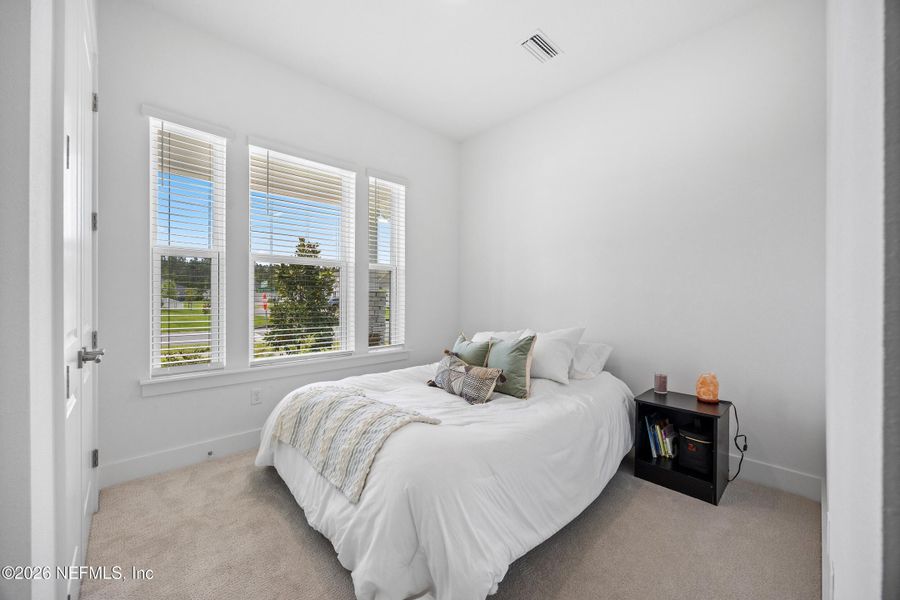 Furnished interior view inside a new home in Oak Grove at SilverLeaf 60’, St. Augustine (Image 10).